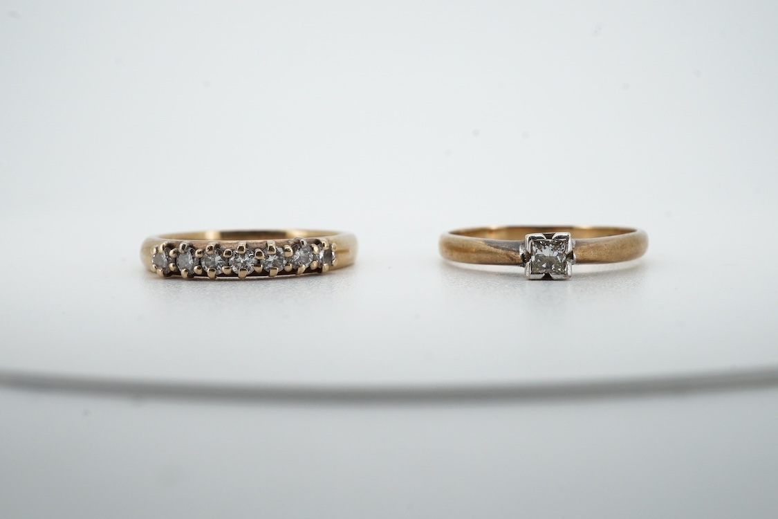 A 9ct gold and solitaire diamond set ring, size O/P and a 9ct gold an seven stone diamond set half hoop ring, size O, gross weight 4 grams.